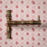 Bamboo-Toilet_paper_holder_aged_brass with roll front