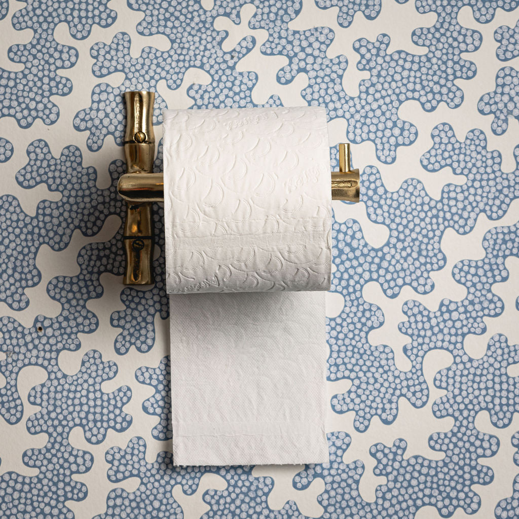 Bamboo Toilet Paper Holder, Lacquered Brass with a roll