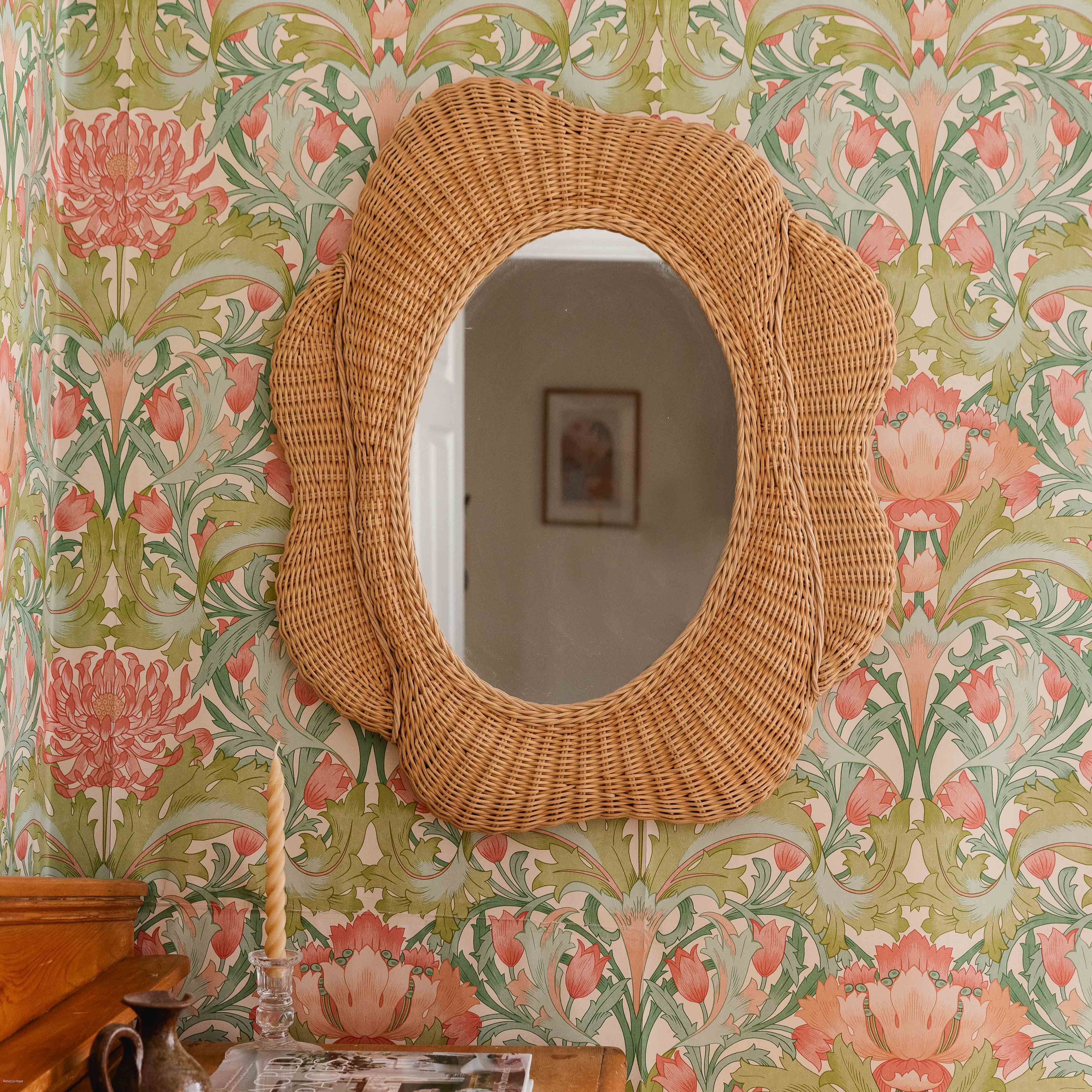 Blossom-rattan-oval-mirror-font-on