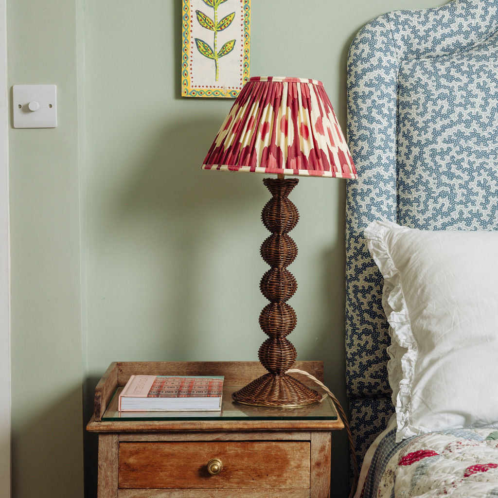 Bobbin-rattan-lamp-base-teak-on-a-side-table