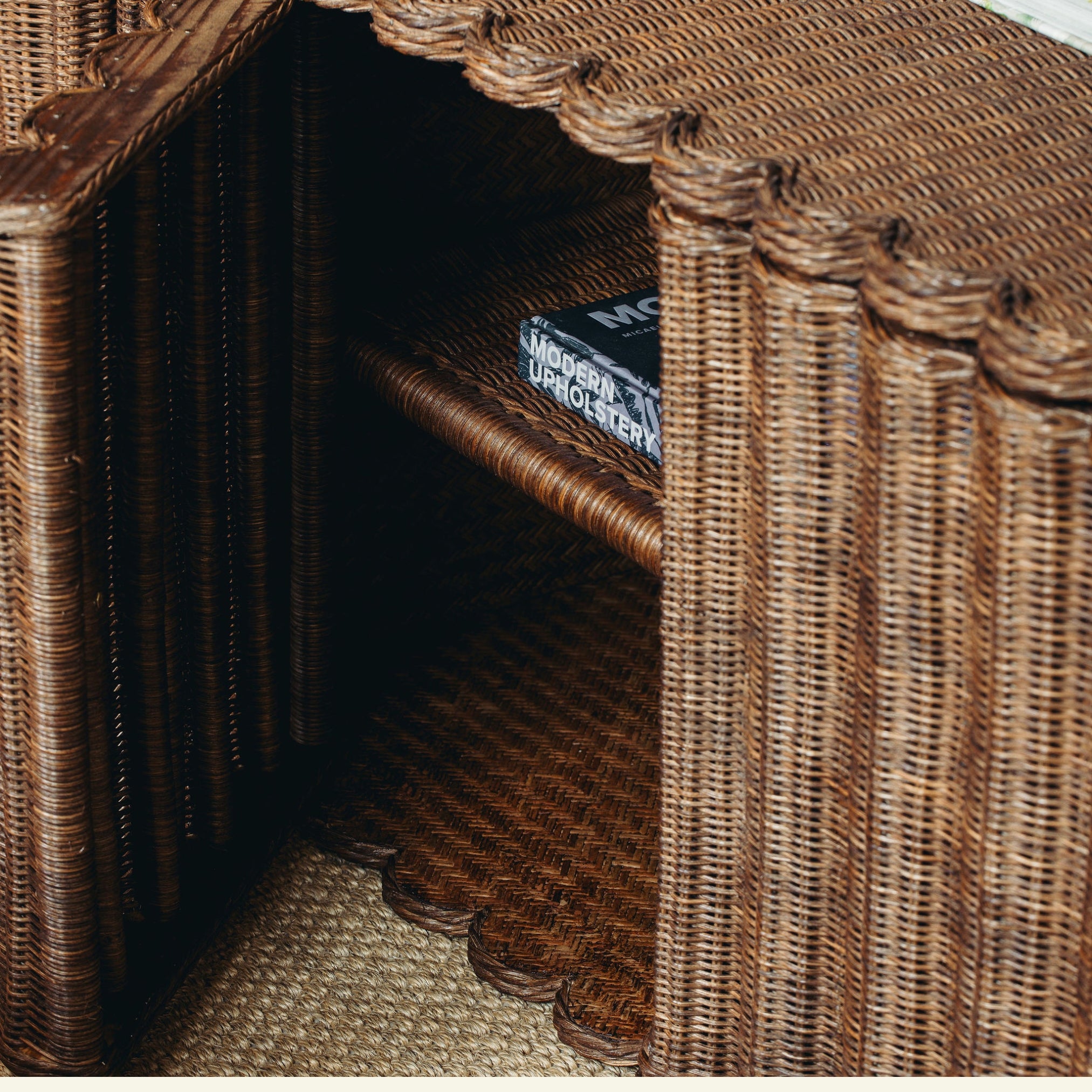 Daisy coffee table with a book titled 'Modern Upholstery' inside