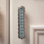 Delilah Handle Blue, Polished Chrome on cream