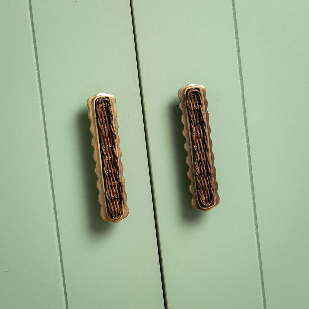 Delilah Handle Teak, Aged Brass on green