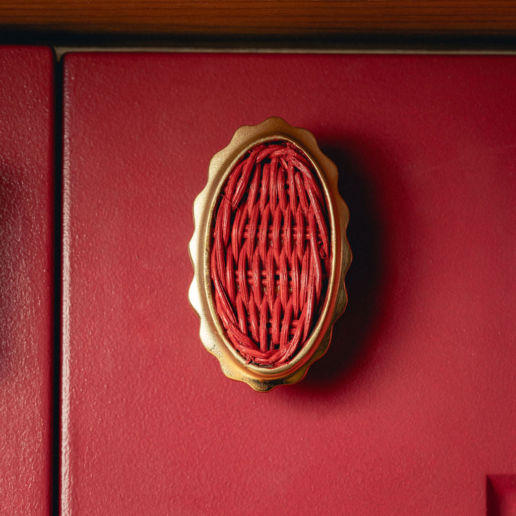 Delilah Oval Knob Red, Lacquered Brass on red