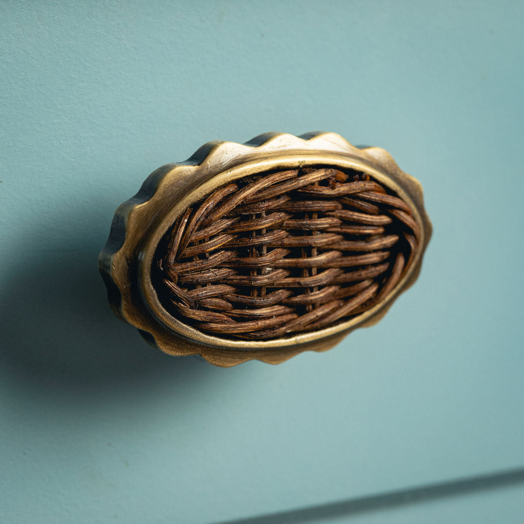 Delilah Oval Knob Teak, Aged Brass close up
