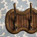 Delilah Rattan 3-Hook Rail, Aged Brass closeup