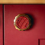 Delilah Round Knob Red, Lacquered Brass on red
