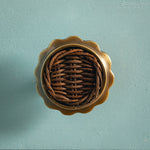 Delilah Round Knob Teak, Aged Brass close up on blue