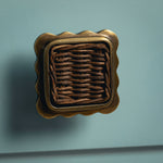 Delilah Square Knob Teak, Aged Brass on blue close up