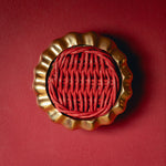 Eloise Round Knob Red, Lacquered Brass on red close up