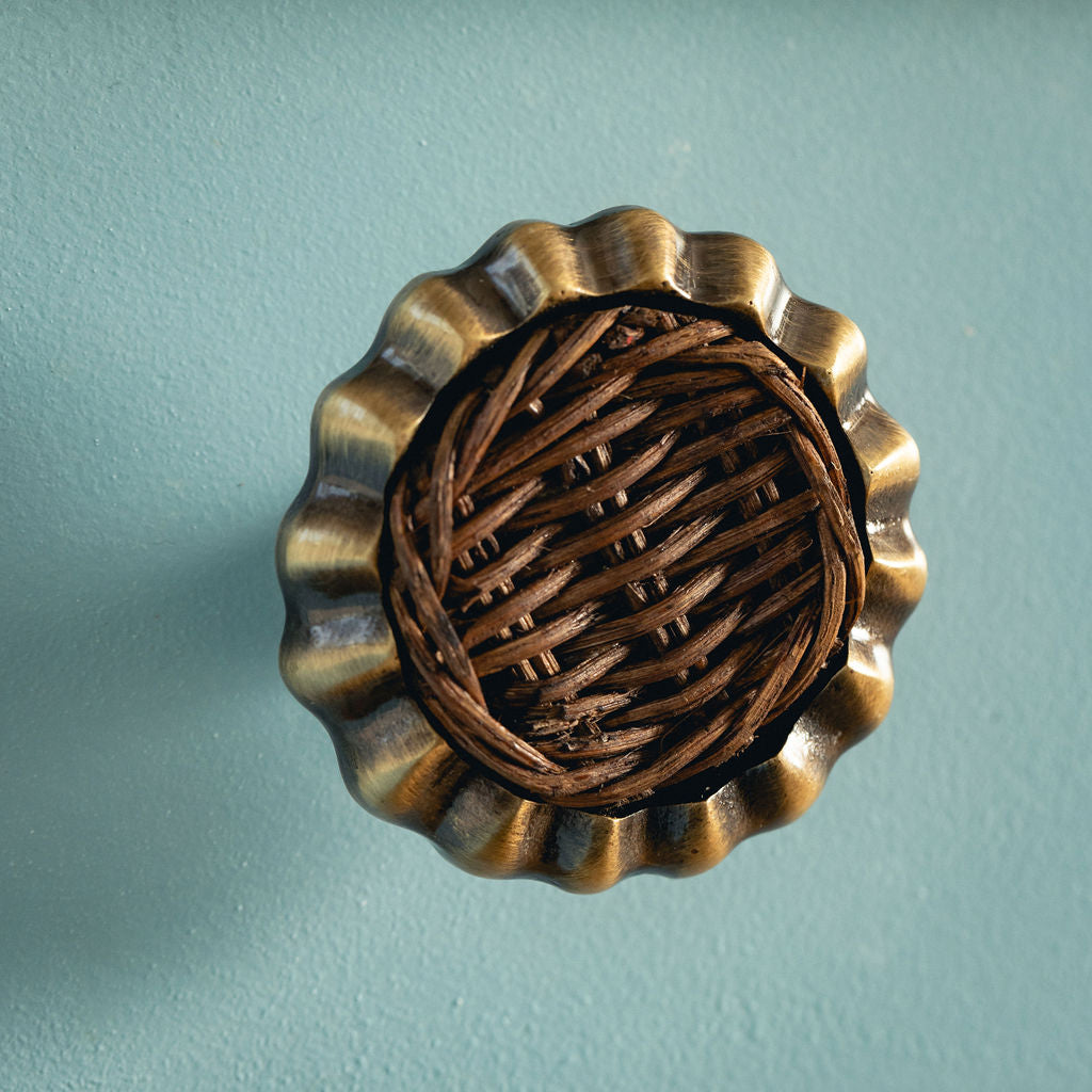 Eloise Round Knob Teak, Aged Brass on blue close up