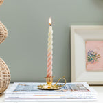 SCALLOPED-BRASS-CANDLE-HOLDER-WITH-CANDLE