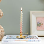 SCALLOPED-BRASS-CANDLE-HOLDER-WITH-CANDLE