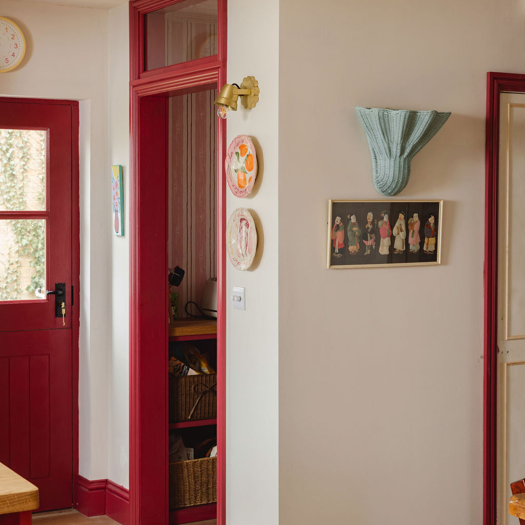 Luna-wall-light-large-light-blue-on-a-wall