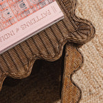 Peony-rattan-coffee-table-with-a-sofa-open-door-close-up