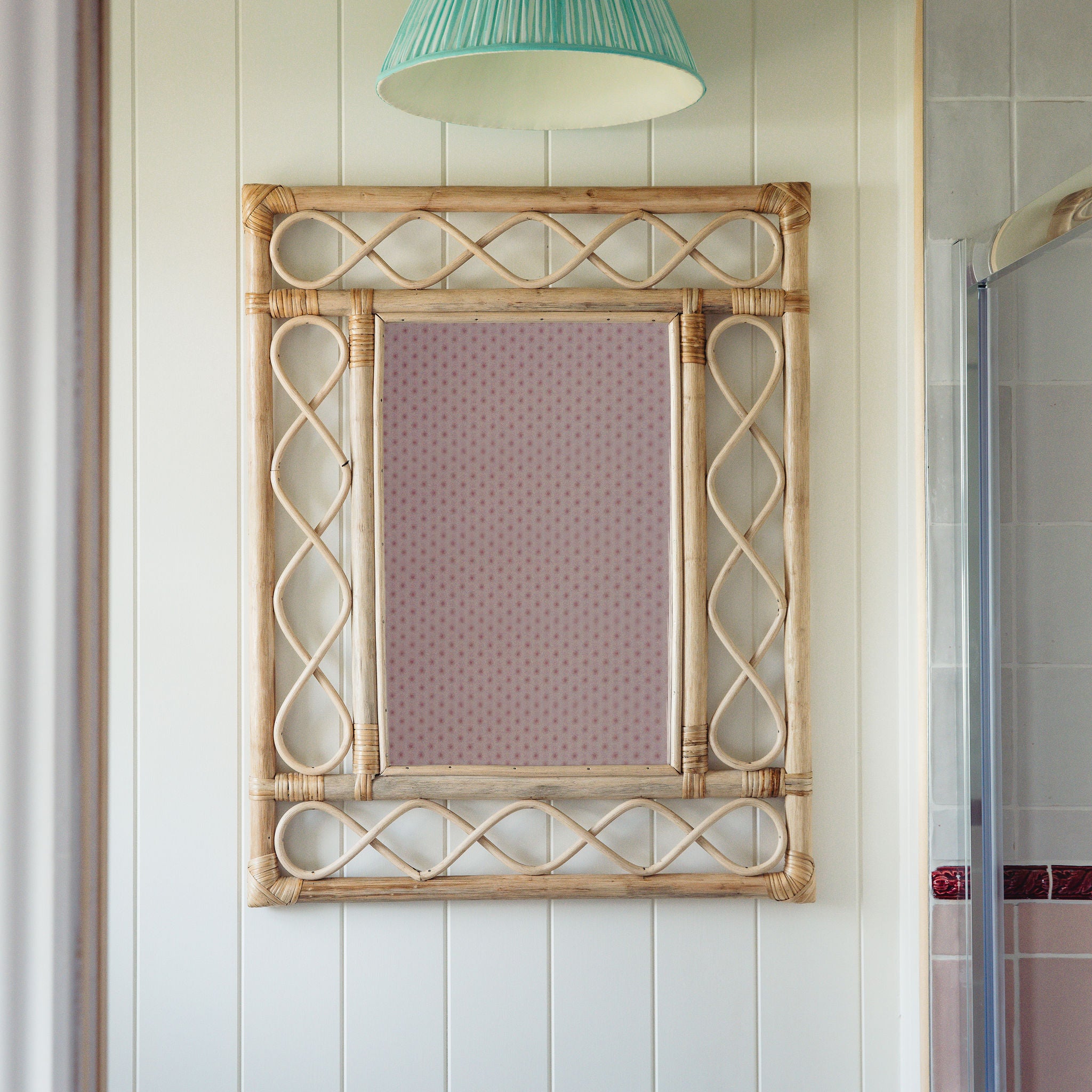 Retro-rattan-mirror-on-a-white-wall