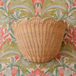 Scalloped-rattan-wall-light-small-natural