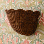 Scalloped-rattan-wall-light-small-teak