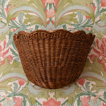 Scalloped-rattan-wall-light-small-teak