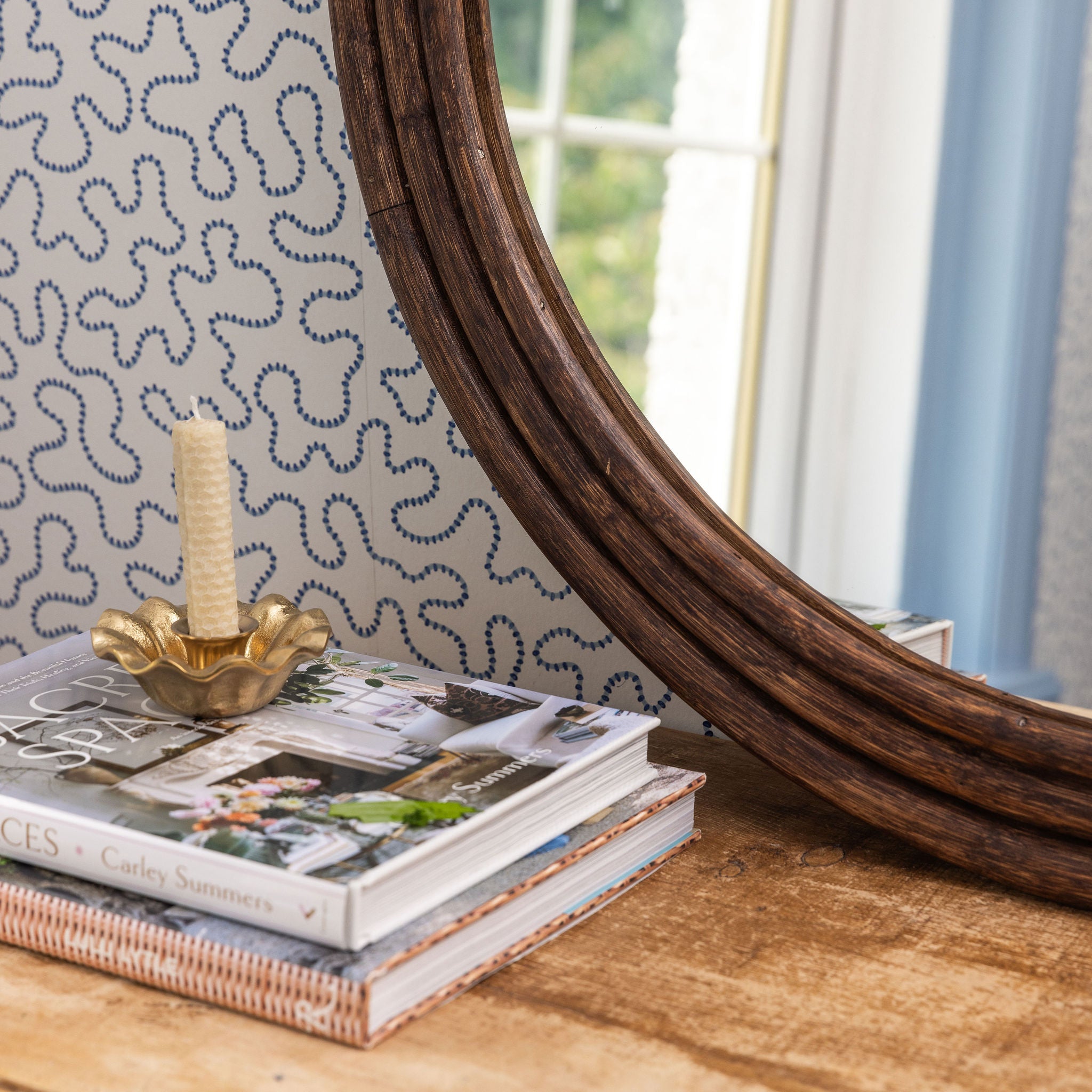 Terra-rattan-mirror-teak-close-up