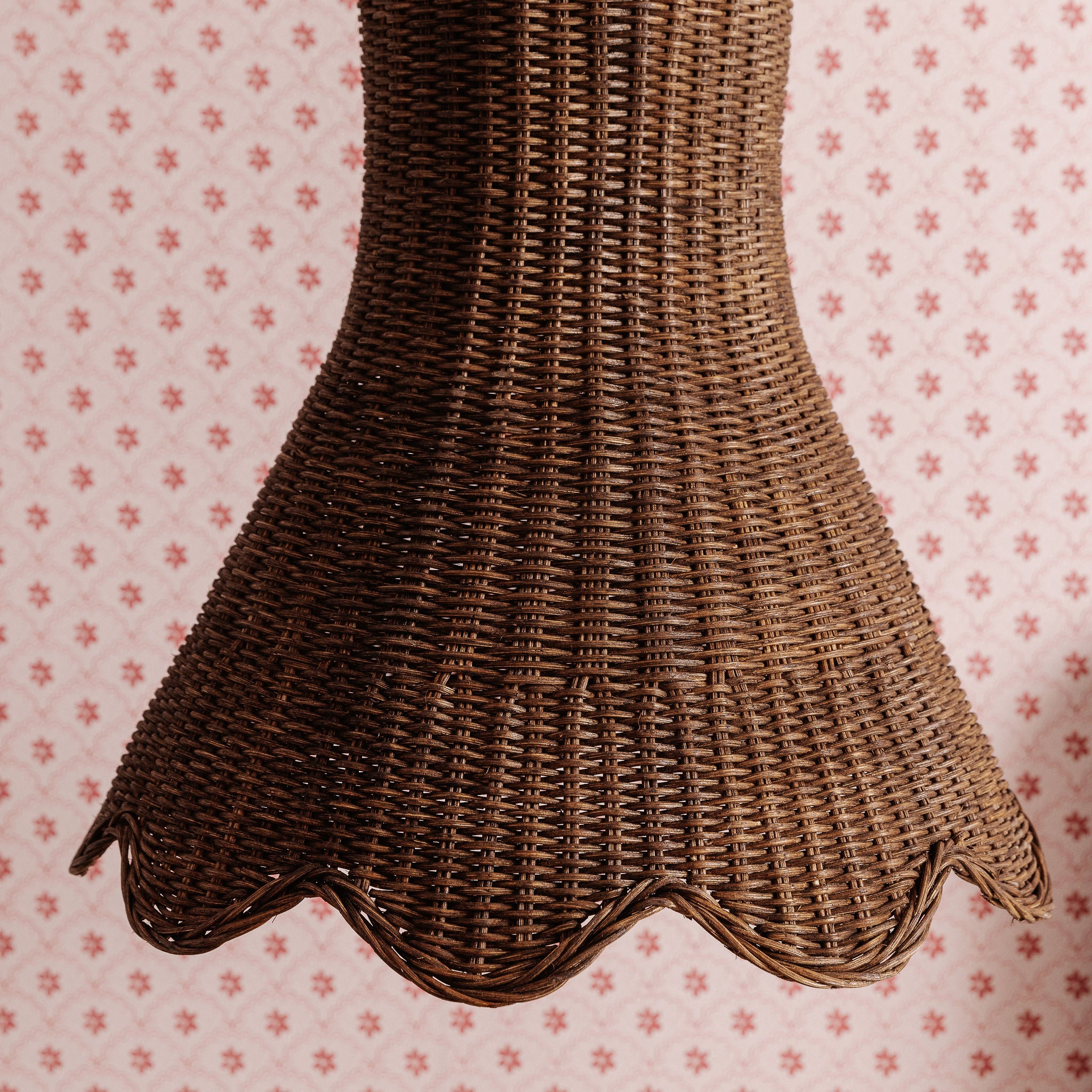 Calla Wicker basket on a pink floral patterned background