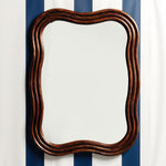 WAVE-RATTAN-MIRROR-LARGE-ON-A-WALL